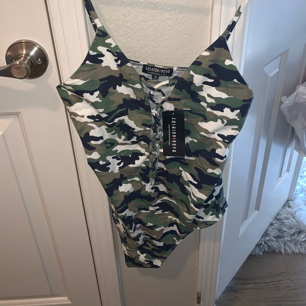 Never worn camo body suit